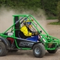 Green Gemini Buggy on dirt track
